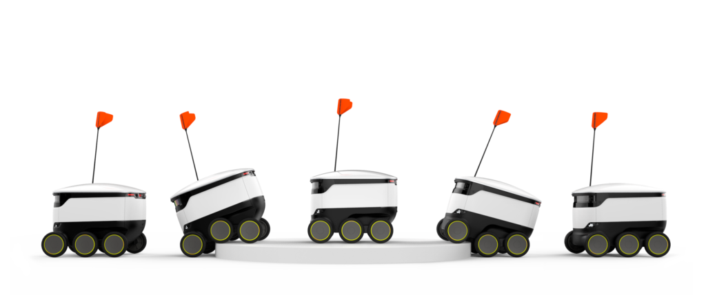 clip art image of 4 small robots rolling over a panel using LiDAR technology